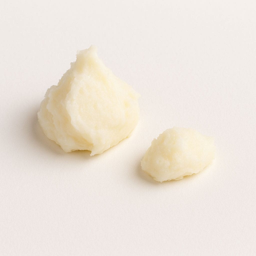 Close-up of Shea Butter on white background, Purecontour.